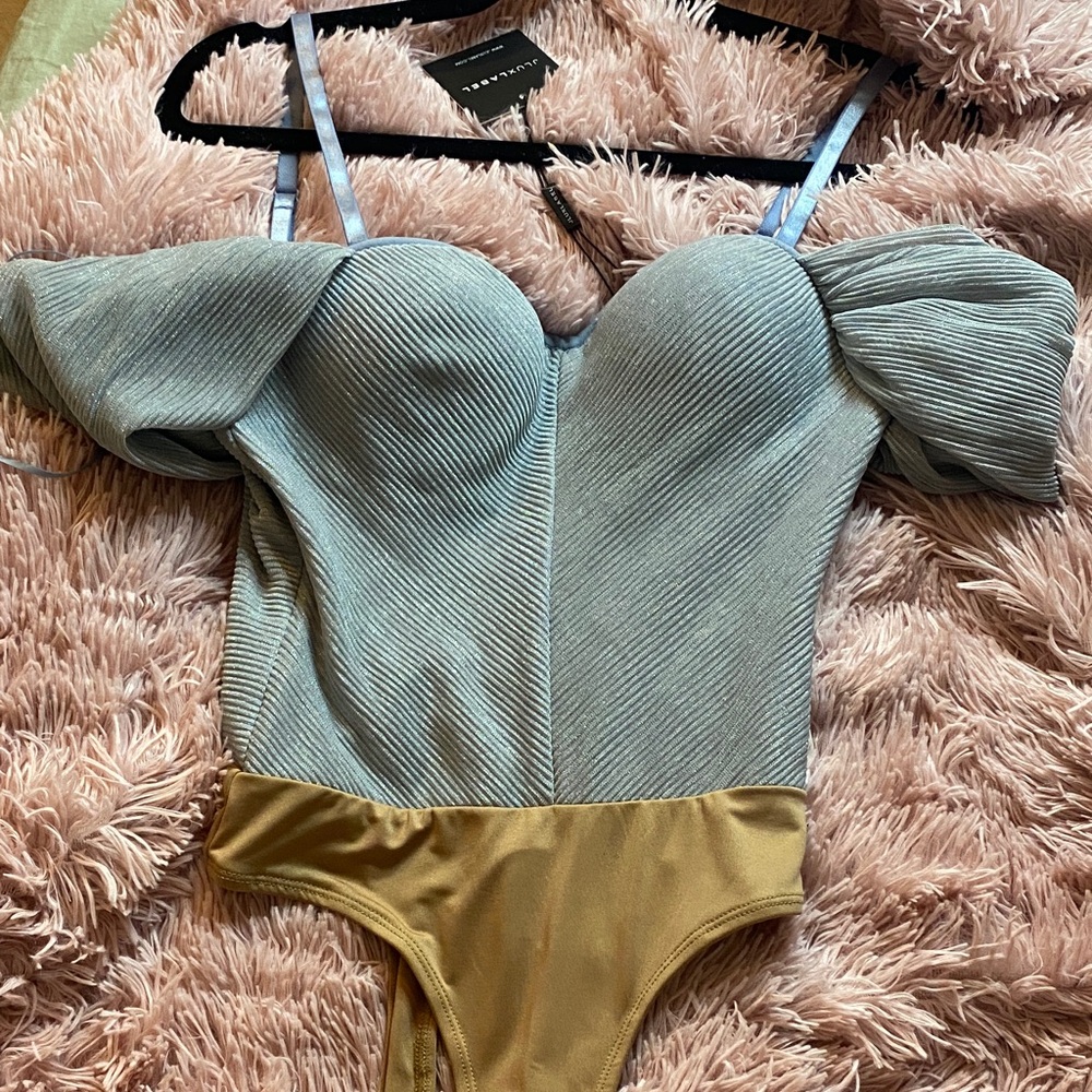 Baby blue off the shoulder bodysuit. NWT
